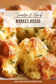 a close up of some bread on a plate with the words cheese and herb monkey bread