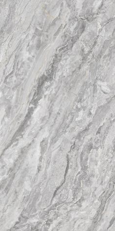 a white marble textured surface with grey and yellow lines on the top right hand corner