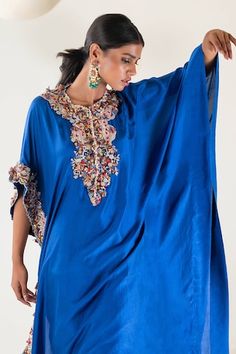 Royal blue kaftan with placement embroidery using resham, zardozi and suta work. Paired with a pant. - Aza Fashions Designer Wear Kaftan With Intricate Embroidery For Navratri, Designer Intricate Embroidery Kaftan For Navratri, Designer Navratri Kaftan With Intricate Embroidery, Bollywood Style Kaftan With Resham Embroidery For Reception, Silk Kaftan With Zari Work For Reception, Traditional Embroidered Kaftan For Reception, Embroidered Kaftan For Eid Reception, Eid Reception Embroidered Kaftan, Embroidered Kaftan With Traditional Drape For Reception