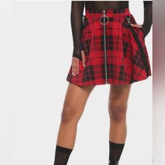 Black & Red Plaid O-Ring Suspender Gothic Skater Skirt. New Nwot. Let This Skater Skirt Skate Right Into Your Wardrobe With Its Cute Shape And Comfy Style. Printed All Over With Black And Red Plaid And Featuring Hip Pockets And Functional Front Zipper. 95% Polyester; 5% Spandex Wash Cold; Dry Low Imported Listed In Junior Sizes Model Wears Size Small; 16 1/2" Long Punk Style Skirt For Winter Cosplay, Punk Style Winter Skirt For Cosplay, Winter Cosplay Punk Skirt, Rock Style Mini Skirt For Fall, Punk Style Mini Skirt For Fall Alternative Fashion, Red Punk Skirt For Fall, Punk Streetwear Skirt For Fall, Rock Style Red Mini Skirt, Red Rock Mini Skirt