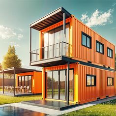 two orange shipping containers sitting next to each other on top of a grass covered field