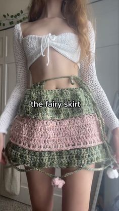 a woman wearing a skirt and crop top with the words, the fairy skirt written on it