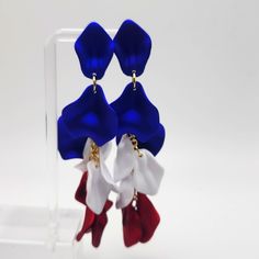 Red White And Blue Extra Long Petal Earrings Drop: 5" Petals Are Acrylic (Lightweight) Beautiful Glossy White With Metallic Red And Blue Finish Gives Great Dimension To These Long Statement Earrings. Patriotic Blue Earrings For Party, Blue Patriotic Drop Earrings, Patriotic Blue Drop Earrings, Patriotic Blue Dangle Jewelry, 4th Of July Blue Drop Earrings, Blue Jewelry For 4th Of July Party, Patriotic Blue Jewelry For Party, New Fashion Earrings, Mickey Earrings