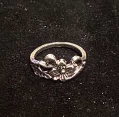 This stunning silver floral ring with leaf design is perfect for those who love nature and flowers. The ring is crafted with intricate details and features a beautiful flower shape, making it a great addition to any jewelry collection. The ring is perfect for any occasion. Whether you're looking for a statement piece or a unique gift, this ring is sure to impress. Adjustable Silver Flower Ring Nature-inspired, Nature-inspired Silver Flower Ring, Nature-inspired Silver Flower Ring For Anniversary, Silver Nature-inspired Open Flower Ring, Nature-inspired Silver Open Flower Ring, Cinderella Flower, Nature And Flowers, North Hills, A Beautiful Flower