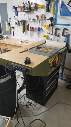 a workbench with tools on it in a garage