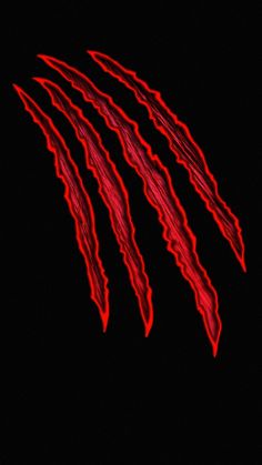 an image of red streaks in the dark