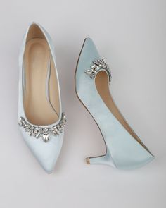 "Perfect pointy toe pump with low heels combined with sparkly teardrop rhinestones creates elegance and beauty. Easy slip on with comfort and perfect wear for fall or summer wedding, bridesmaids, bridal party, holiday party, and any special occasions. DETAILS: HEEL HEIGHT: 2.25 inches COLORS AVAILABLE: White, Champagne, Light Blue, Soft Blush, Ivory, Navy, Burgundy UPPER: Synthetic upper and lining MATERIALS: Manmade outsole Not sure of which size to purchase? Shoes measurements are as follow: (Please note measurements taken the length of inside of shoe from toe to heel) Size 6 - 9.75\" Size 7 - 10\" Size 8 - 10.25\" Size 9 - 10.5\" Size 10 - 10.875\" PLEASE NOTE: WE RECOMMEND LEAVING 1/2 INCH GAP OF SPACE - We DO NOT offer refunds. Selected items are eligible for EXCHANGE ONLY within 14 d Blue Wedding Flats, Light Blue Wedding Shoes, Crystal Wedding Shoes, Women's Slip Ons, Blue Wedding Shoes, Light Blue Wedding, White Champagne, Wedding Flats, Betsey Johnson Shoes