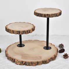 Quantity: 3-Tier Cake Stand + 1 Bag of Tools Material: Metal And Wood Wood Slice Color: Natural Metal Pole Color: Black Style: 3-Tier Wooden Cake and Cupcake Stand Overall Size: 13.75"H x 21"L Total Wood Slices: 3 Small Wood Slice: 8.5" Dia. Medium Wood Slice: 9.75" Dia. Large Wood Slice: 17" Dia. Thickness of each Wood Slice: 1" Total Poles: 2 Short Pole Size: 6" L x 3"W Long Pole Size: 11.75"L x 3" W Bag of Tools Content: 13x Nails (1x Nail is EXTRA) 1x Screw Driver Assembly Required: Yes Feat Booth Layout Ideas, Tree Cake Stand, Baby Shower Charcuterie, Cheese Board Display, Treat Tables, Wooden Cupcake Stands, Cranberry Wedding, Booth Layout, Wood Cupcake Stand