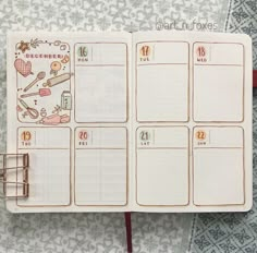 an open planner with stickers on it