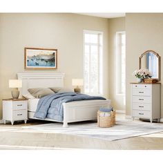 a bedroom with a bed, dresser and mirror