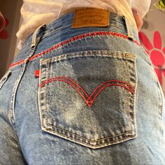 Custom Levis Jeans, Christmas Jeans Diy, Cross Stitch Jeans, Diy Jeans Refashion Creative, Embroidered Jeans Aesthetic, Embroidery Inspo Clothes, Sewing Inspo Easy, Embroidery Pants Ideas, Embroidery Patterns On Jeans