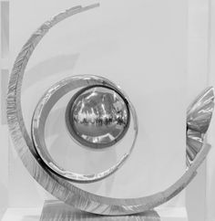 an award is displayed on a white surface