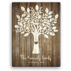 Make this rustic-inspired family tree, rooted in love, a welcome symbol in your home. Our canvas features a lovely tree with a heart cutout on the trunk, mounted on a wooden plank background. There is also room to personalize two lines at the bottom of the canvas to make it a one-of-a-kind piece of art that comes ready to hang. Size: 18" x 24".  Color: Black. Family Tree Graphic, Family Tree Canvas, Our Family Tree, Family Tree Painting, Tree Of Love, Personalised Family Tree, Family Tree Wall, Tree Graphic, Love Canvas