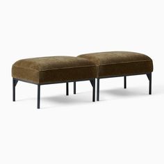 a pair of footstools in brown fabric