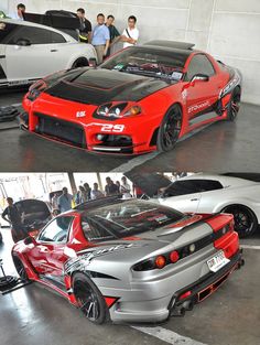 two different cars parked in a garage with people looking at them