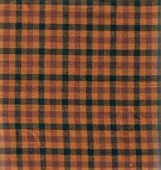 an orange and black checkered fabric