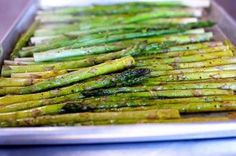 asparagus on a tray ready to be cooked