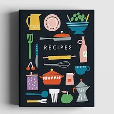 a cookbook with an illustrated image of kitchen items