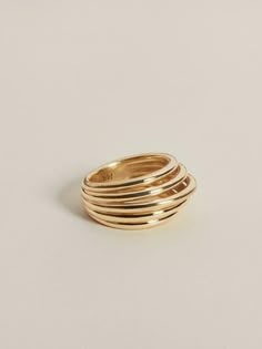 Billowing yet structured, these pieces take cues from avant proportion, exploring how graceful softness can be found within precise form. Coiled and stacked version of the Form Ring II. Each round band is hand made in solid gold or silver with a high polish finish, extending beyond the finger and forming contoured high Gold Right Hand Rings, J Hannah, Classy Jewelry, 18k Gold Ring, Stacked Jewelry, Jewelry Lookbook, Solid Gold Rings, Timeless Jewelry, All That Glitters