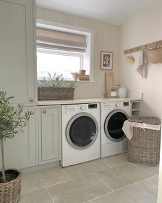 a washer and dryer in a small room