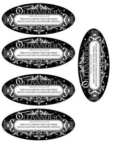 four black and white labels with ornate designs on them, all in different shapes and sizes