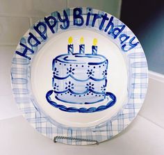 a plate with a birthday cake on it