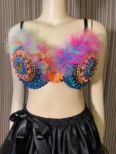 This exciting beaded black bra is covered in bright Mardi Gras beads, with big gold rhinestone centers, rainbow maribou feather upper,and added ribbons to the back.  Burlesque, Mardi Gras costume, or just for fun.  The original Sofra size 38B has been embellished by Prima Donna's.  As is, sales final, no returns. Decorated Bras Ideas, Decorated Bras For A Cause, Decorated Bras, Bra Art, Costume Bra, Mardi Gras Costumes, Mardi Gras Beads, Carnival Costumes, Gold Rhinestone