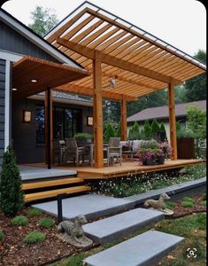 a covered patio with steps leading up to it