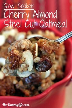 a red bowl filled with oatmeal and nuts