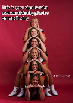 a group of women posing for the camera with their arms around each other and texting, this is your sign to take awkward family photos on media day