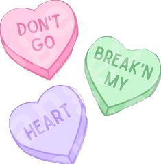 three heart shaped candys with words that say don't go breakin'my heart