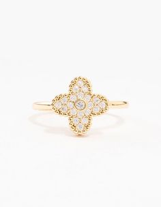 Make a lucky statement with this charming ring. Crafted using gold plated metal and shimmery cubic zirconia crystals and a clover shaped design, this ring is perfect for bringing some luck and charm into all of your looks. Material: Crystal, Cubic Zirconia, Gold Plated Dimensions: Diameter 18.5 mm x Band Width 1 mm Feature Dimensions: Feature Width 11 mm x Feature Length 11 mm | Lovisa Gold Plated Cubic Zirconia Clover Statement Ring, Size: Small/Medium Clover Ring, Shape Design, Cubic Zirconia, Statement Rings, Gold Plate, Plating, Band, Crystals, Gold