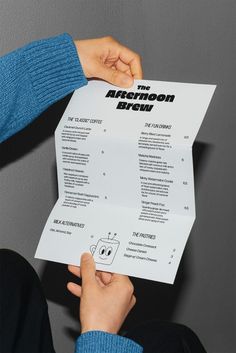 a person holding up a paper with the information below it that says, the afternoon brown