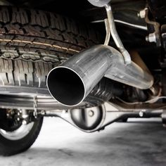 the back end of a car with exhaust pipe