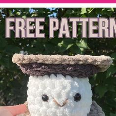 a crocheted owl wearing a hat with the words free pattern on it's front