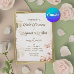 an image of a wedding card with roses on the table and petals scattered around it