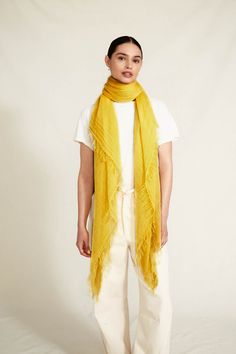 Made from our signature blend of cashmere and silk this scarf sports a tangy yellow hue. Super soft and lightweight with a fringed trim, it's perfect for year-round wear. 70% Cashmere, 30% Silk. 58" x 62" Woven in Inner Mongolia. Yellow Bohemian Silk Scarf For Spring, Yellow Bohemian Silk Scarf For Summer, Elegant Yellow Silk Scarf, Bohemian Yellow Silk Shawl Scarf, High-end Yellow Silk Scarf For Summer, Inner Mongolia, Mongolia, Silk Scarf, Cashmere