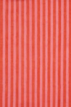 an orange and pink striped fabric with vertical stripes