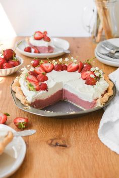 there is a pie with strawberries on it