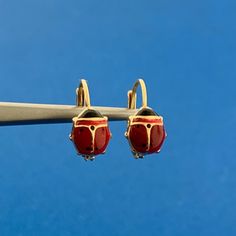 * Milor Italy 18k Yellow Gold Red Black Enamel Lady Bug Insect Earrings * Length: 1/2" * Width: 3/16" * Weight: 1.1 Tgw * Marked: 18kt * Milor * Italy * 750 * Fastening: Lever Back-Included * Condition: As Pictured. * G2993 Insect Earrings, Bugs And Insects, Lady Bug, Black Enamel, Red Gold, Favorite Jewelry, Bugs, Jewelry Earrings Dangle, Insects