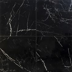 black marble tiles with white lines on them