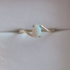 14k White Gold Natural Opal Ring. Size 5.50. Can Be Resized. In Good Condition. Opal Has Lots Of Fire. Makes A Great Valentines Day Gift. Will Come In Black Ring Box. White 14k Gold Jewelry With Polished Finish, Dainty White Solitaire Birthstone Ring, Oval White Birthstone Jewelry, White Oval Birthstone Jewelry, Hallmarked White Gold Birthstone Ring, White Birthstone Jewelry In 14k Gold, White 14k Gold Ring As Gift, White 14k Gold Birthstone Jewelry, White Birthstone 14k Gold Jewelry