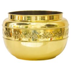 a golden bowl with an ornate design on it