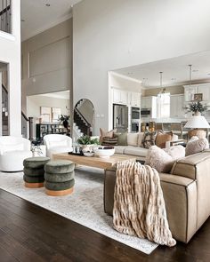 a living room filled with lots of furniture