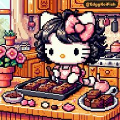 an image of a hello kitty cooking in the kitchen with her cake and cupcakes