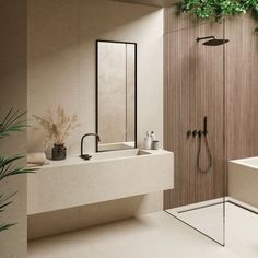 a bathroom with a shower, sink and bathtub next to a plant on the wall