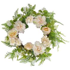 a wreath with white and pink flowers on it