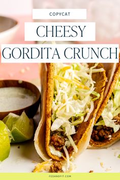 A copycat cheesy gordita crunch taco sits on a white countertop next to lime slices. Crunch Tacos, Crunchy Taco Shells, Fed And Fit, Taco Shell, Crunch Recipe, Fit Recipes, Homemade Juice, Soft Tacos, Special Sauce