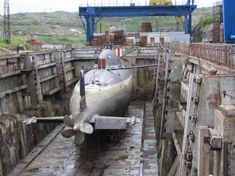 a submarine sitting in the middle of a tunnel