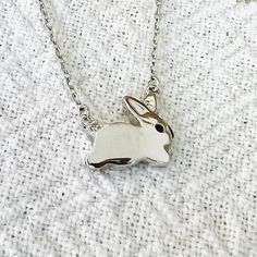 "Dainty BUNNY necklace . little bunny . small rabbit necklace . easter necklace . spring necklace . 925 Rhodium Plated STERLING SILVER . Material: 925 Rhodium Plated Sterling Silver   Chain: .5mm . Pendant size:  1/4\" (12mm) . Comes in a cute reusable gift box . Please let me know if you want more details or pictures Silver material is lifetime guaranteed. Thank you very much for looking!" Silver Kawaii Necklace For Gift, Silver Bunny Design Jewelry For Gifts, Silver Jewelry With Bunny Design For Gift, Silver Bunny Design Jewelry Gift, Bunny Necklace Jewelry, Easter Necklace, Small Bunny, Spring Necklace, Rabbit Necklace